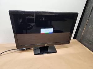 lot 28 image: HP LCD Monitor with Power Adapter