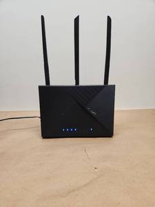 lot 31 image: ASUS RT-AC65 Dual Band AC WiFi Router with Three Antennas
