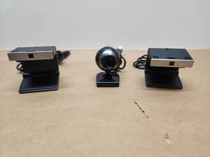 lot 32 image: Mixed Brand Web Camera Bundle - Samsung TV Camera and HP Webcam