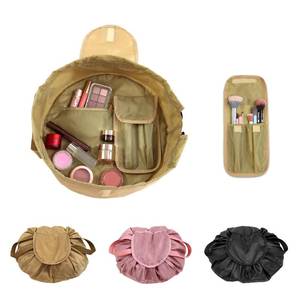 lot 8096 image: SUMBABO Drawstring Cosmetic Bag for Women - Barrel Travel Make Up Organizer Bag for Toiletry with Brush Area (Khaki) - Retail $10