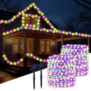 lot 8355 image: Baquler 2 Piece 98ft 8 Modes 300 Solar Mardi Gras LED Lights Outdoor Decor Waterproof Lights for Outside Mardi Gras Yard Decor Supplies (Yellow, Green, Purple) - Retail $24