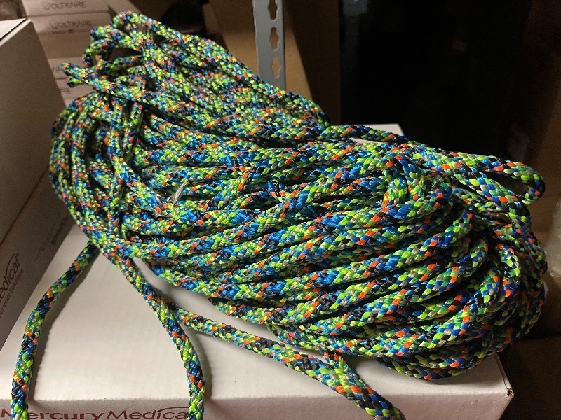 lot 71 image: Braided Bungie Type Rope - 60 Great for Utility Rope on a Boat - Use for Towing Tubes, Tying off docks Etc - Green