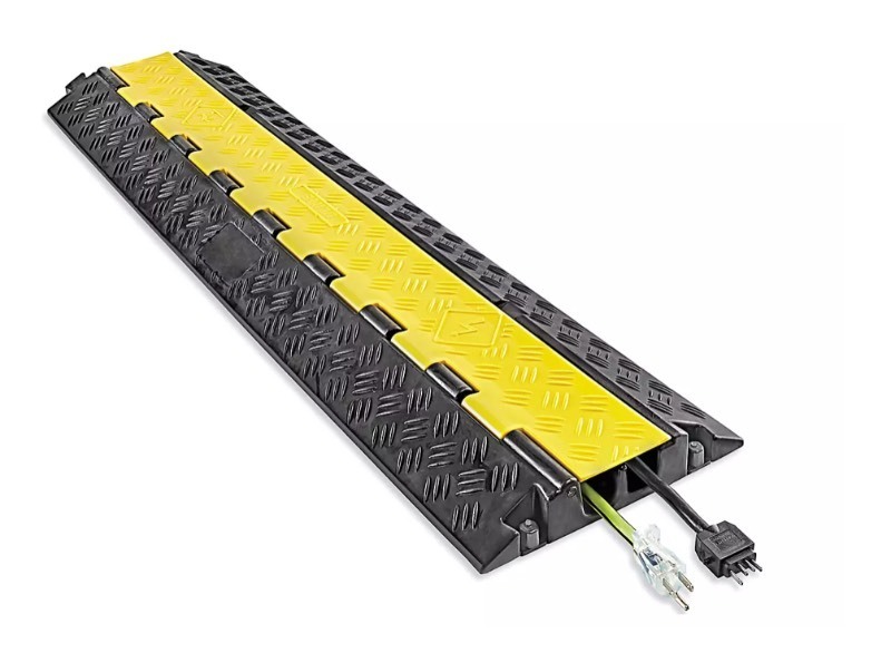 lot 34 image: Uline 2 Channel Heavy Duty Cable Protector - 39 x 10 x 2 Retails $195