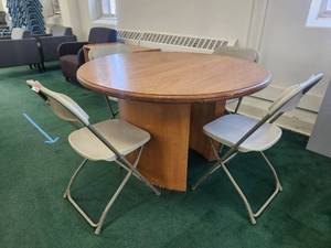 lot 20065 image: Round Wood Dining Table with Folding Chairs Set