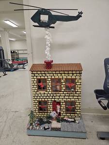 lot 20199 image: Christmas Village Dollhouse with Helicopter Display