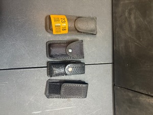 lot 23118 image: Lot of Misc. Pepper Spray Holsters w Pepper Spray