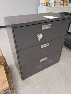 lot 8 image: Gray Metal Lateral File Cabinet with Three Drawers  - Retail $796
