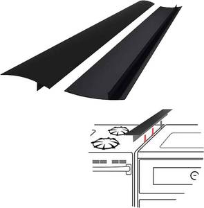lot 8495 image: SEVCHY Silicone Stove Gap Covers (2 pack), Oven Gap Filler, Heat Resistant Stove Gap Filler, Seal Gap between Stovetop and Counter, Easy Clean (21 inch, Black) - Retail $8