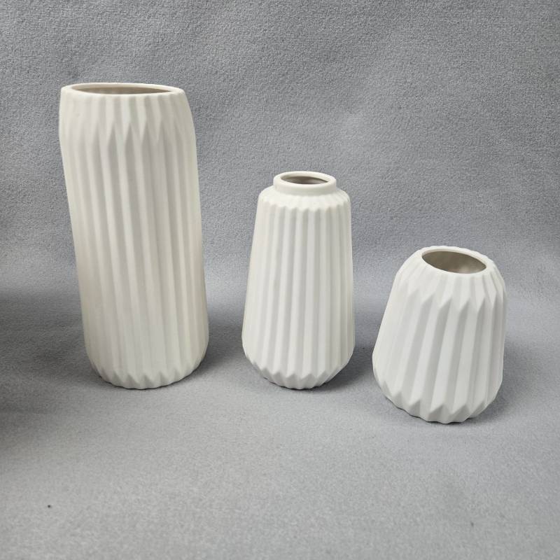 lot 177 image: Modern White Geometric Ceramic Vase Set