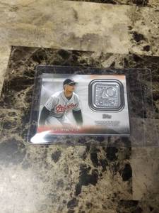 lot 343 image: 2021 Topps 70th Anniversary Logo Patch Cal Ripken Jr. Baltimore Orioles Baseball Card