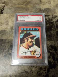 lot 351 image: 1975 Topps Mini Andy Etchebarren Baltimore Orioles Baseball Card
