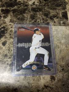 lot 465 image: 2000 Fleer Mystique Cal Ripken Jr. Baltimore Orioles Baseball Card