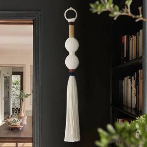 lot 32031 image: IOWER Macrame Wall Hanging Boho Decor Yarn Wall Art Small Sphericity Cotton Textile Tassel Hanging Fiber Art for Living Room Bedroom 27 L x 2.3 W - Retail $15