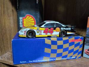 lot 97 image: NASCAR Collectibles Bundle - Die-Cast Cars, Cards & Books