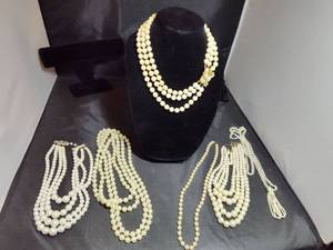 lot 128 image: Multi-Strand Pearl Necklace with Floral Clasp