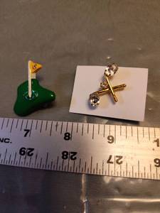 lot 158 image: Two golfing type pins