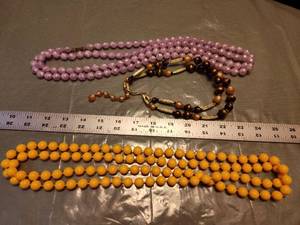 lot 176 image: Lot of 2 Beaded Necklaces - Purple Glass and Yellow Plastic