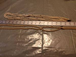 lot 201 image: Two beaded  necklaces one needs to be repaired