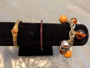 lot 216 image: Designer Charm Bracelet with Carved Cameo and Rubies