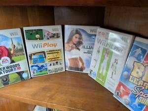 lot 253 image: Nintendo Wii Sports & Fitness Games Bundle