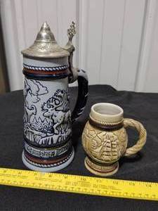 lot 9 image: Vintage 1976 & 1982 Avon Beer Steins Set - Alaskan & Nautical Themes