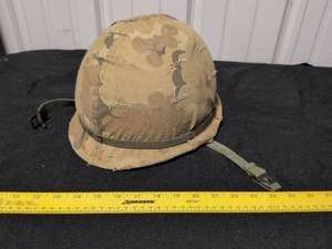 lot 20 image: Vietnam Era M1 Combat Helmet with Duck Hunter Camo Cover