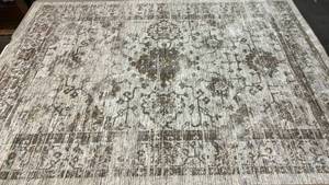 lot 2011 image: Threshold Vintage Distressed Tan Industrial Area Rug 7x10.