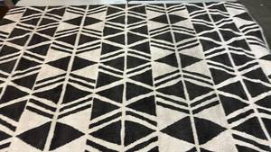 lot 2022 image: Threshold Black and White 7x10 Area Rug.