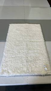 lot 3005 image: Room Essentials White Shag Accent Rug 26 x 310