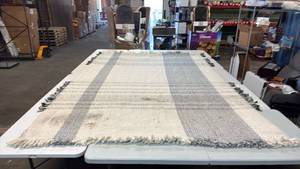 lot 8009 image: Threshold 7x10 Hand Woven Wool Area Rug with Fringe