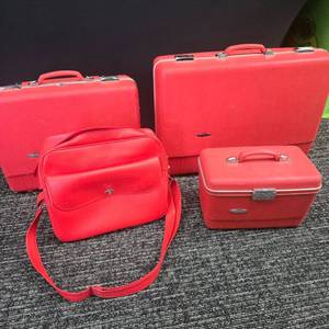 lot 377 image: Red Forecast Luggage Set with Train Case and Shoulder Bag