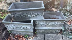 lot 11 image: Concrete Rectangular Planters with Grape Vine Relief (set of 6) RETAIL $60