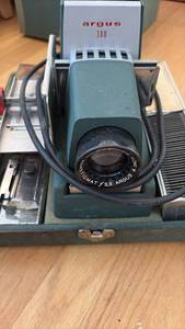 lot 59369 image: Argus 300 Slide Projector with Case and Accessories - Retail $25
