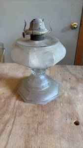 lot 52085 image: Clear Glass Oil Lamp with Metal Burner - Retail $15