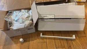 lot 52188 image: Bulk Lot White Cabinet Hardware Door Handles and Knobs - Retail $25