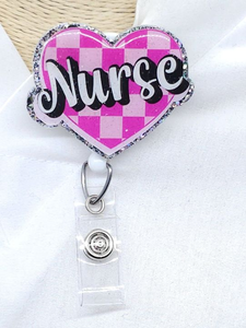 lot 2627 image: Pink Nurse Badge Reel with Retractable Cord