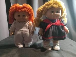 lot 3469 image: Cabbage Patch Kids Dolls with Yarn Hair and Original Outfits