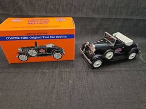 lot 4258 image: Cooper Tire Original Test Car Replica Model A Die Cast Car with Box