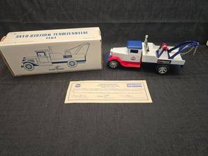 lot 4267 image: 1931 International Wrecker Bank Die Cast Tow Truck