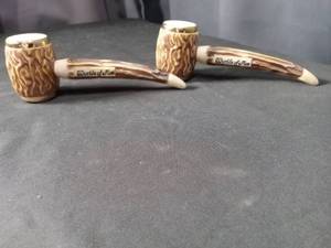 lot 4449 image: Worlds of Fun Tobacco Pipes salt and pepper shaker set