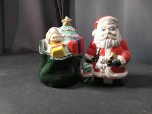 lot 4504 image: Christmas Santa and Sants Bag Salt and Pepper Shaker Set