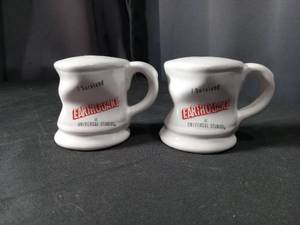 lot 4510 image: I Survived Earthquake Universal Studios Commemorative Coffee Mugs Set of 2 salt and pepper shaker set