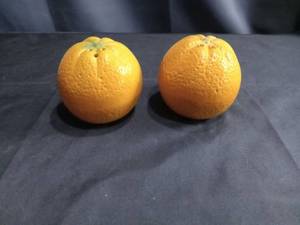 lot 4137 image: Orange Shaped Salt and Pepper Shakers
