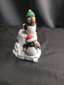 lot 4325 image: Christmas Penguin Figurines on Snow Base
