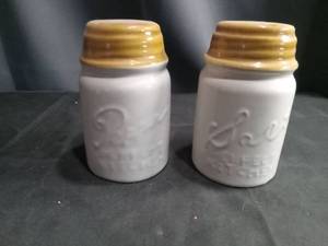 lot 4339 image: White Ceramic Salt and Pepper Shakers with Yellow Tops
