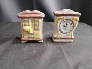 lot 4365 image: Ceramic Miniature Clock and dresser  Salt and Pepper Shakers