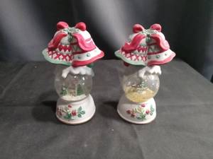 lot 4366 image: Pair of Christmas Bell Snow Globes with salt and pepper shaker on top