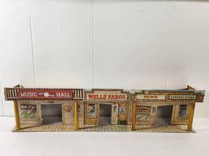 lot 93 image: Marx Tales of Wells Fargo Tin Litho Streetfront Playset