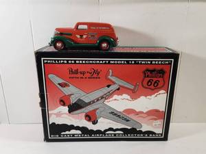 lot 96 image: Phillips 66 Die Cast Metal Airplane Collectors Bank & Vehicle