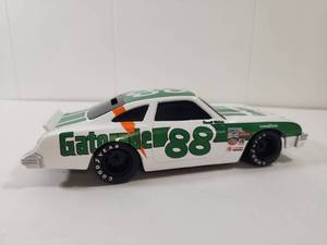 lot 119 image: Waltrip Gatorade NASCAR #88 Die Cast Race Car Model 124 Bank With Key